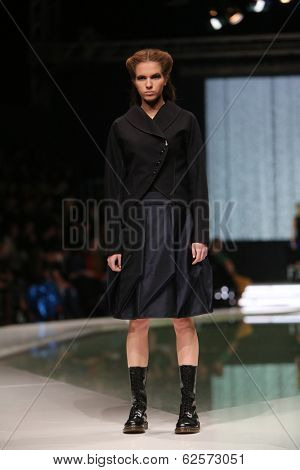 ZAGREB, CROATIA - MARCH 29: Fashion model wearing clothes designed by Branka Donassy on the 'Fashion.hr' show on March 29, 2014 in Zagreb, Croatia