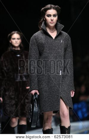 ZAGREB, CROATIA - MARCH 29: Fashion model wearing clothes designed by Branka Donassy on the 'Fashion.hr' show on March 29, 2014 in Zagreb, Croatia