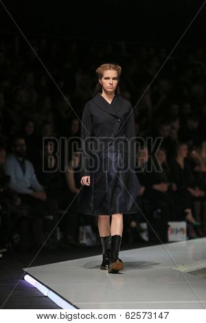 ZAGREB, CROATIA - MARCH 29: Fashion model wearing clothes designed by Branka Donassy on the 'Fashion.hr' show on March 29, 2014 in Zagreb, Croatia