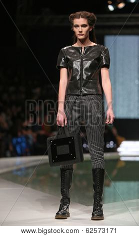 ZAGREB, CROATIA - MARCH 29: Fashion model wearing clothes designed by Branka Donassy on the 'Fashion.hr' show on March 29, 2014 in Zagreb, Croatia