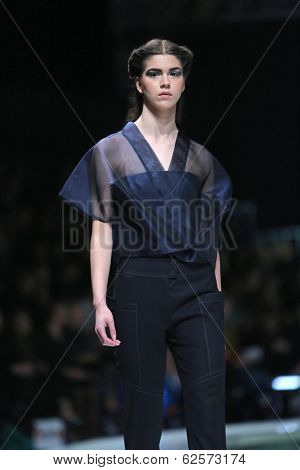 ZAGREB, CROATIA - MARCH 29: Fashion model wearing clothes designed by Branka Donassy on the 'Fashion.hr' show on March 29, 2014 in Zagreb, Croatia