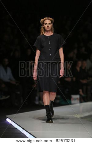 ZAGREB, CROATIA - MARCH 29: Fashion model wearing clothes designed by Branka Donassy on the 'Fashion.hr' show on March 29, 2014 in Zagreb, Croatia