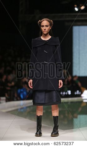 ZAGREB, CROATIA - MARCH 29: Fashion model wearing clothes designed by Branka Donassy on the 'Fashion.hr' show on March 29, 2014 in Zagreb, Croatia