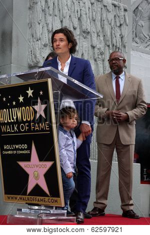 LOS ANGELES - APR 2:  Orlando Bloom, Flynn Bloom at the Orlando Bloom Hollywood Walk of Fame Star Ceremony at TCL Chinese Theater on April 2, 2014 in Los Angeles, CA