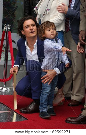 LOS ANGELES - APR 2:  Orlando Bloom, Flynn Bloom at the Orlando Bloom Hollywood Walk of Fame Star Ceremony at TCL Chinese Theater on April 2, 2014 in Los Angeles, CA