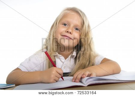 Cute Little Schoogirl Happy On Desk Drawing On Notepad With Marker