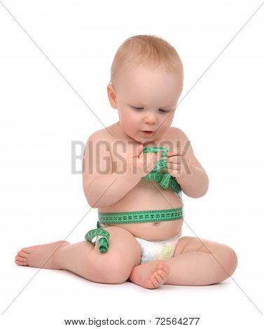 Infant Child Baby Toddler Sitting Playing With Tape Measure Measuring Body
