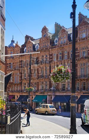 Luxury public house in Mayfair, decorated with flower baskets