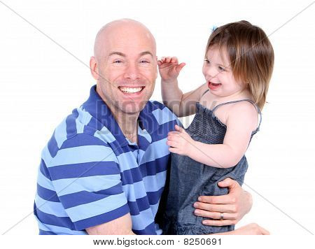 Handsome Father With Cute Daughter Sharing A Laugh