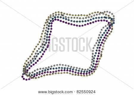 Shiny Gold, Purple, Blue And Silver Mardi Gras Beads On White Background. Symbol Of New Orleans