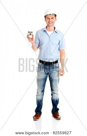 A forewoman holding a model house in hand
