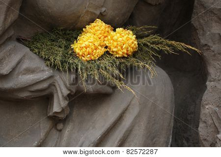 Yellow chrysanthemum at the Josefov Garrison Cemetery in Jaromer, Central Bohemia, Czech Republic.