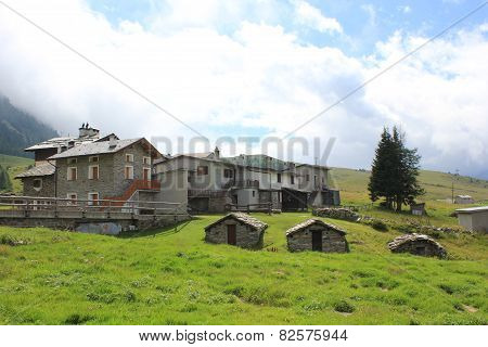 Traditional Stone House In The Valley Floor Of Madesimo