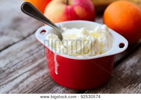 White Ice Cream In Red Bowl