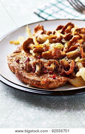 Pork steak with chanterelle mushrooms