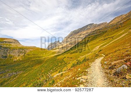 Trail Into An Alpine Valley In Fall
