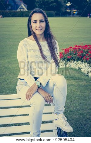 Beautiful Teen On A Bench