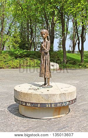 UKRAINE, KYIV - MAY 01, 2013: Hungry girl bronze monument is a monument to Victims of Famine devoted to genocide victims of the Ukrainian people of 1932-1933 years, Kyiv, Ukraine