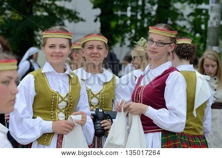 VILNIUS, LITHUANIA - JULY 6: Unidentified peoples in traditional Lithuanian Song Celebration on July 6, 2014 in Vilnius, Lithuania. Song Festival is Lithuania's main cultural event for 2014.