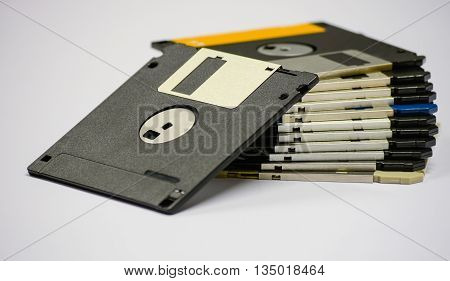 Floppy disk magnetic computer on a white background