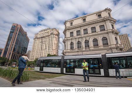 Rio de Janeiro, Brazil - June 13, 2016: New city tram VLT passing Maua Square. Recently inaugurated, it is the newest mode of public transportation, and is free of charge for the first weeks of use.