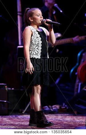 NEW YORK-APR 30: Maisy Stella performs onstage during the 'Nashville' Tour at The Beacon Theater on April 30, 2015 in New York City.