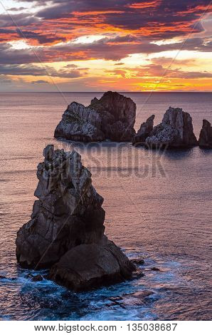 Rocks On Sunset Arnia Beach.