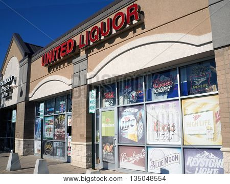 JOLIET, ILLINOIS / UNITED STATES - JUNE 1, 2015: One may purchase liquor at the United Liquor store in a Joliet strip mall.