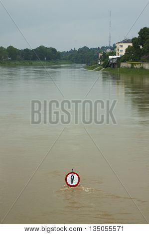 Polnad Kraków flooded Vistula/Wisła river embankments no entry sign over the water