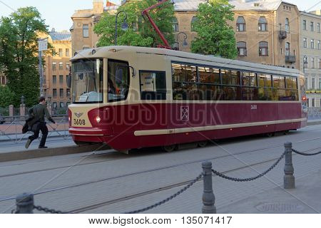 ST. PETERSBURG, RUSSIA - MAY 17, 2016: People in the tram of 40th line. The city tramway system was the world longest since late 1980s till 2000s, but now has 4th place in the world