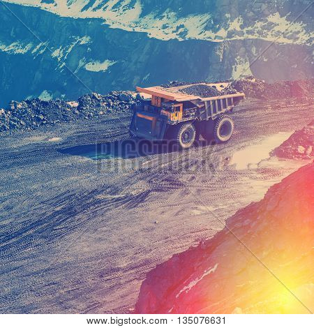 working truck in career on extraction of minerals