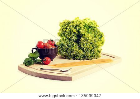 Food ingridients on wooden cutting board