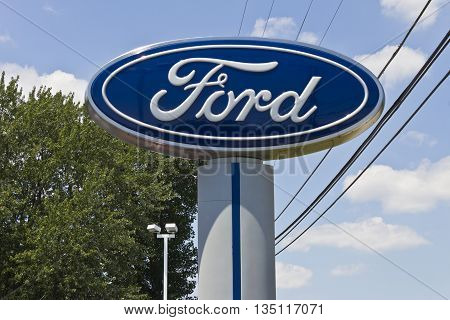 Indianapolis - Circa June 2016: A Local Ford Car and Truck Dealership. Ford is an American Automaker Headquartered in Michigan II