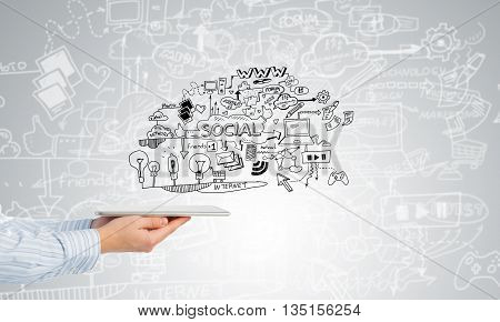 Businessman hand demostrating business strategy plan on tablet screen