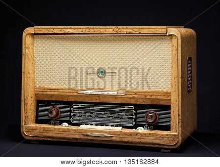 Old vintage radio on a dark background
