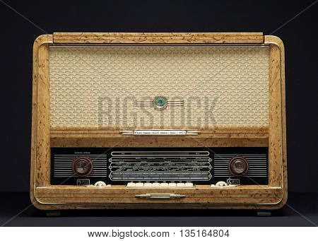 Old vintage radio on a dark background