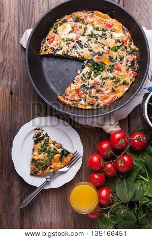 Frittata With Spinach, Tomatoes And Cheese