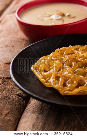 jalebi with rabdi made from condensing milk, famous dessert sweet from India