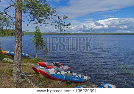 RUSSIA KARELIA LAKE VAYKULSKOE - AUGUST 10 2015: Sport catamarans on the lake. Vaykulskoe Lake Karelia.