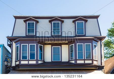 Bay Windows and Dormers on wood building