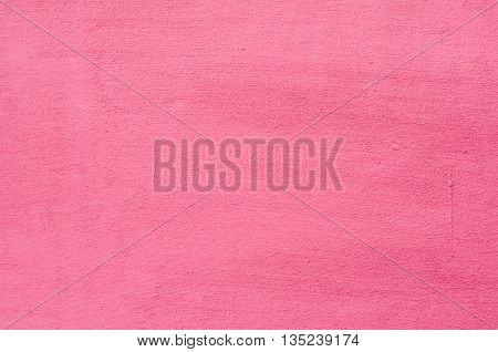 Background of a painted pink wall texture