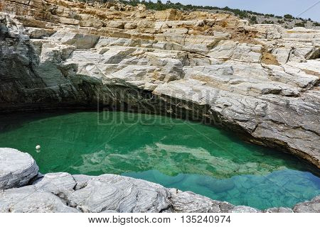 Clean waters of Giola Natural Pool in Thassos island, East Macedonia and Thrace, Greece