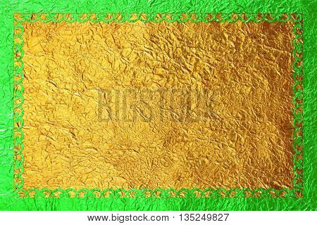 Shiny green frame with a pattern on the gold foil background.