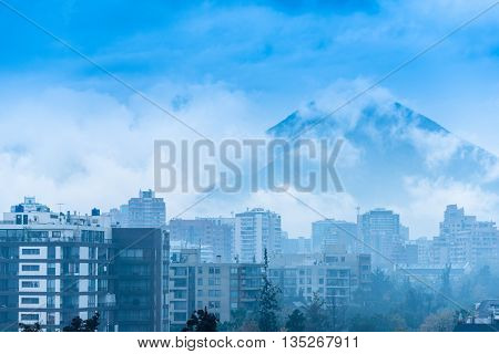 Santiago de Chile under heavy rain and fog