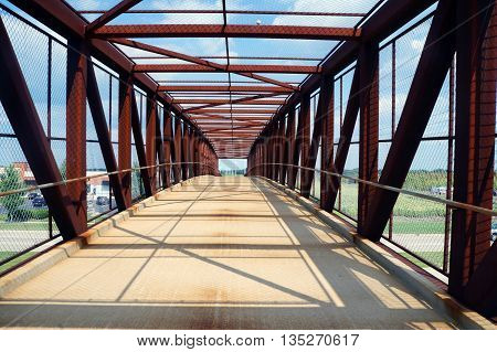 The IL 59 Ped/Bike Bridge allows pedestrians and cyclists safely to cross Highway 59 in Naperville, Illinois.