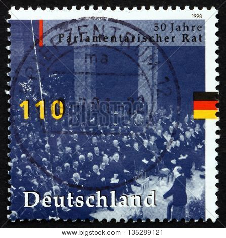 GERMANY - CIRCA 1998: a stamp printed in the Germany shows Parliamentary Council Bonn 1948 Convening to Draw up Constitution circa 1998