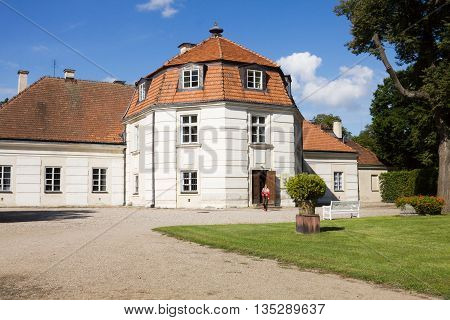 NIEBOROW - POLAND - SEPTEMBER 04 2010: The Manufaktura Building in Nieborow estate in Poland. The manor of Nieborow was built in 16th century. It is today the subsidiary of the National Museum in Warsaw. The Manufaktura was founded as the workshop of arti