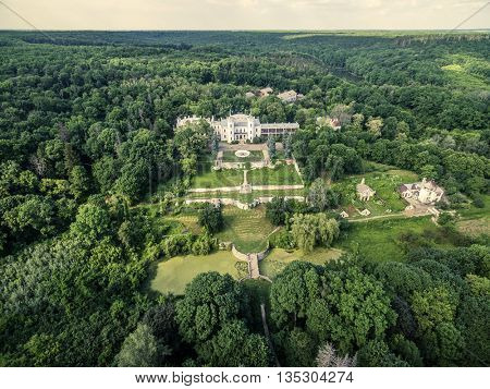 beautiful aerial view on White Swan palace and yard in Sharivka park, Kharkiv region, Ukraine