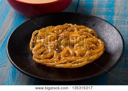 jalebi with rabdi made from condensing milk, famous dessert sweet from India