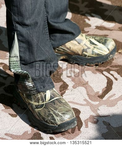 ARLINGTON, TX - APR 18: Pants and boots worn by TV personality Willie Robertson at the ACM & Cabela'??s Great Outdoor Archery Event at the Texas Rangers Youth Ballpark on April 18, 2015.